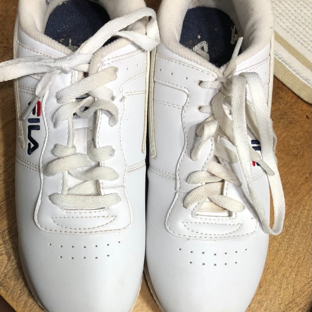 Red, Blue, And White Fila Shoes.